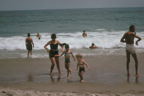 mom with family at beach