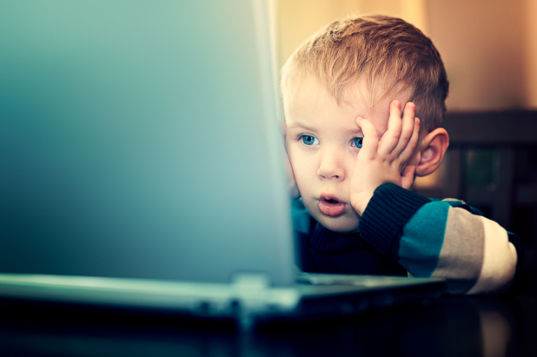 Child looking at computer - USB